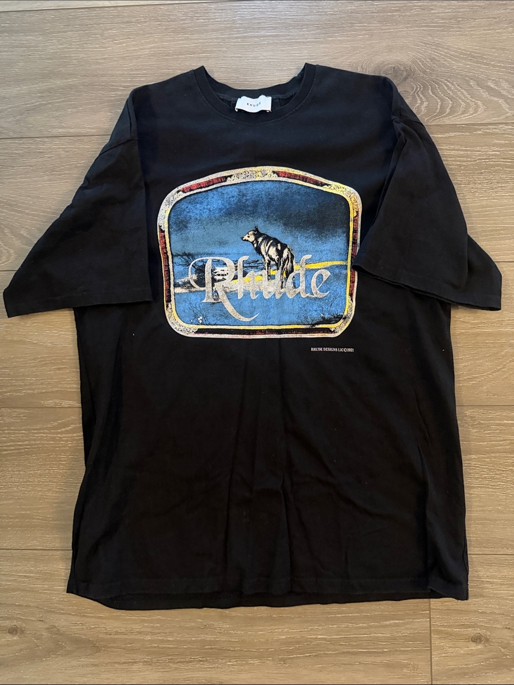 Rhude Black Tee with Blue and Gold Graphic Wolf Logo